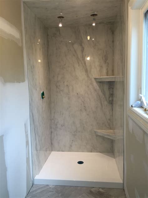 Spray with clean water: Now pour clean water down <strong>marble shower wall</strong> or floor. . How thick is cultured marble shower walls